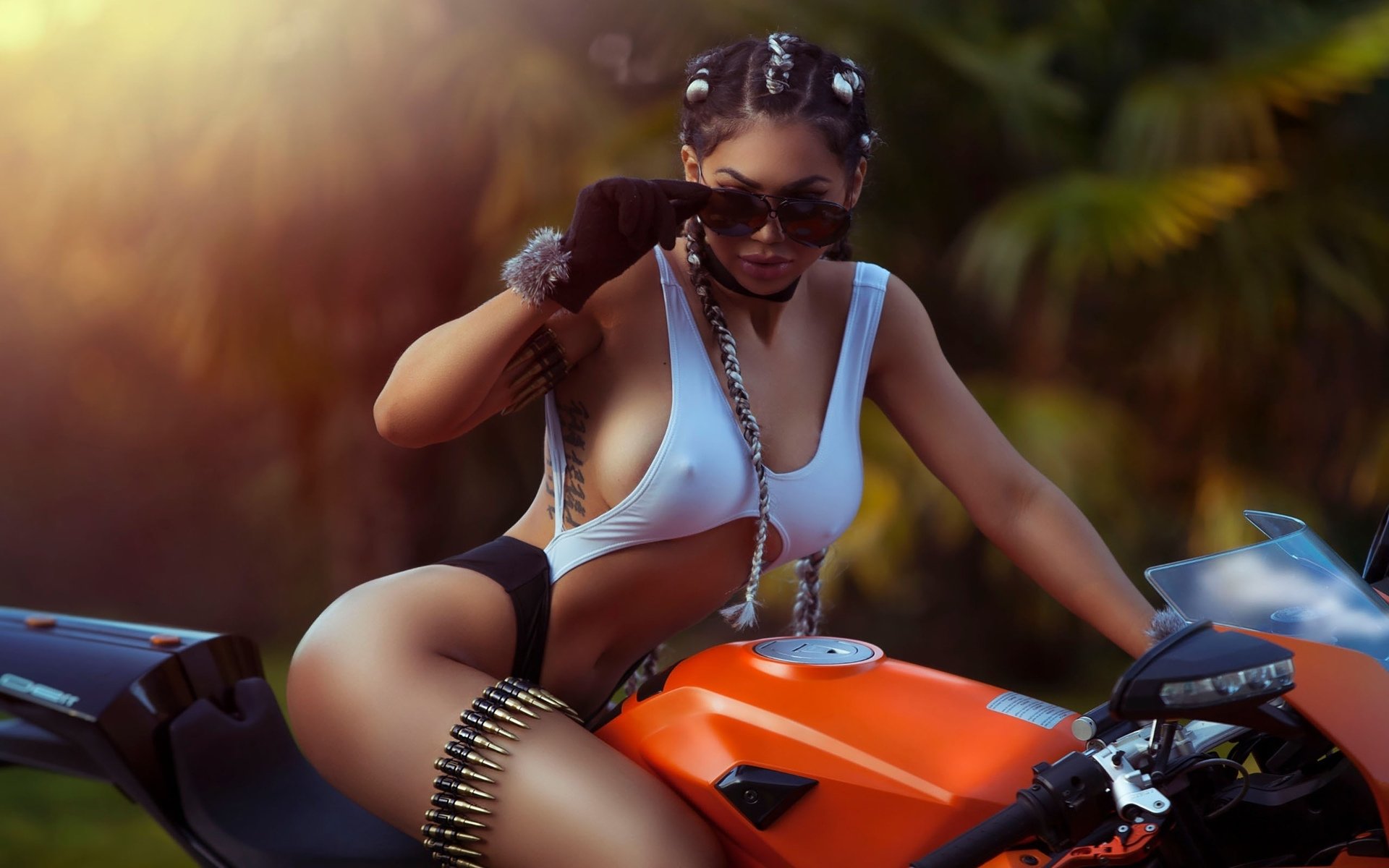 Girls with tattoos and motorcycles in Port-of-Spain